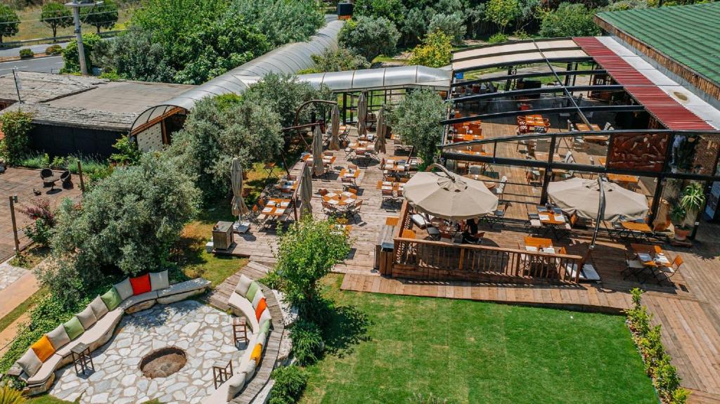 A garden outside Doors Urla Hotel & Bungalows