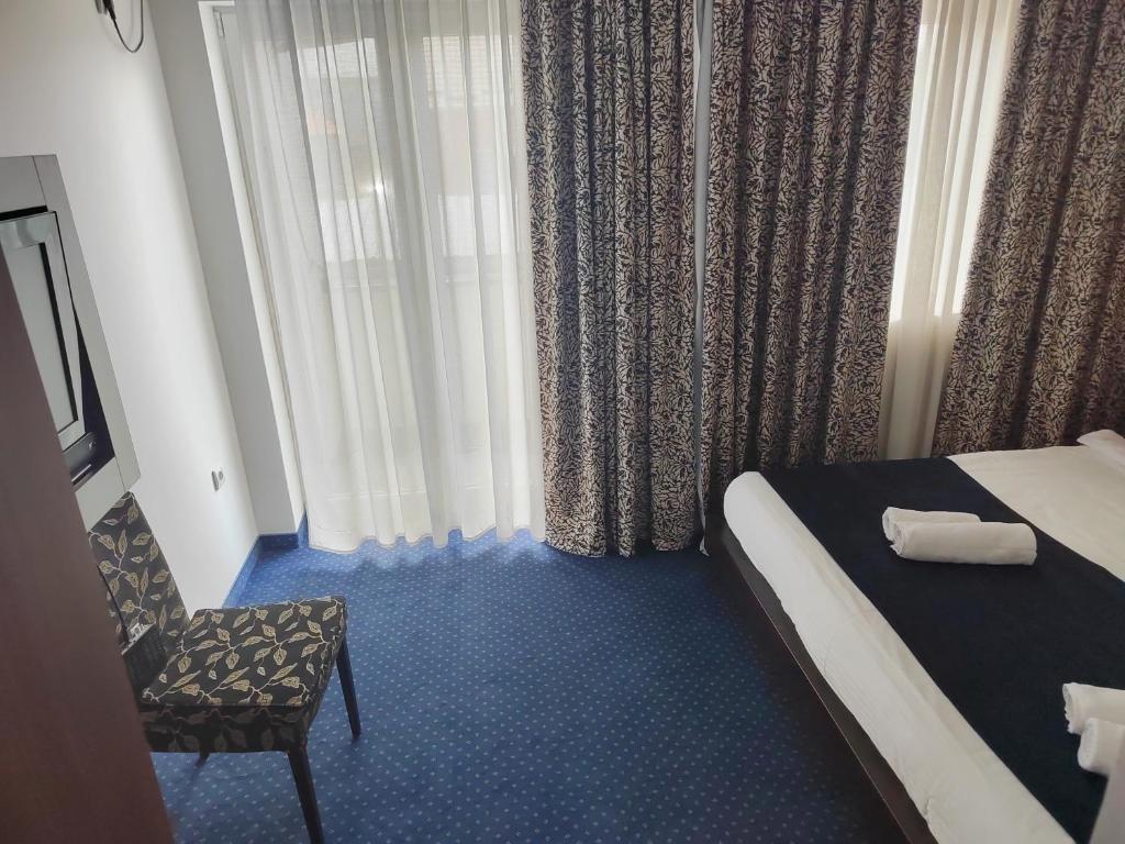 Postel nebo postele na pokoji v ubytování Apartments 29