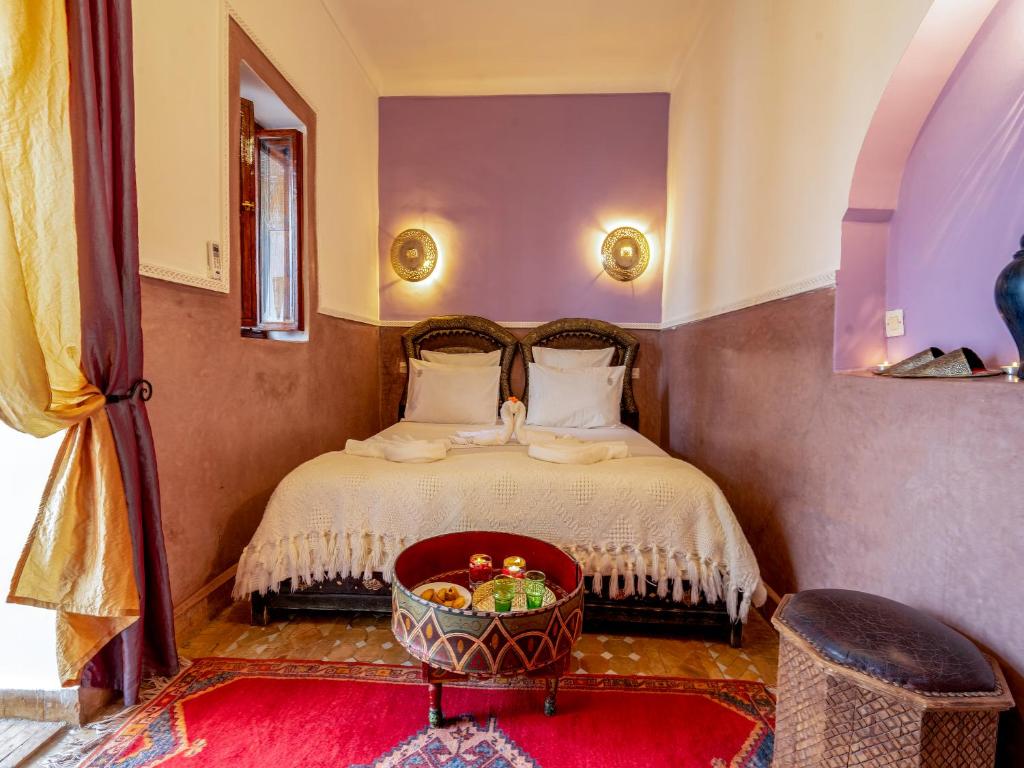 Postel nebo postele na pokoji v ubytování Riad Zehar & Spa Marrakech