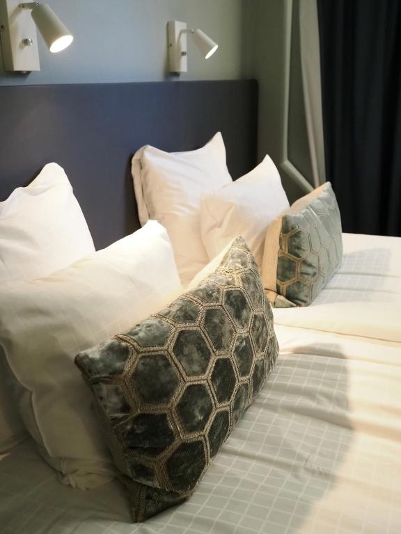 Postel nebo postele na pokoji v ubytování Hotel Söder
