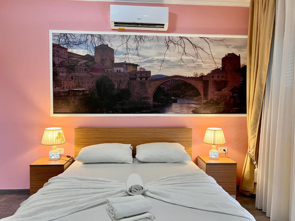 Postel nebo postele na pokoji v ubytování Hotel Nur
