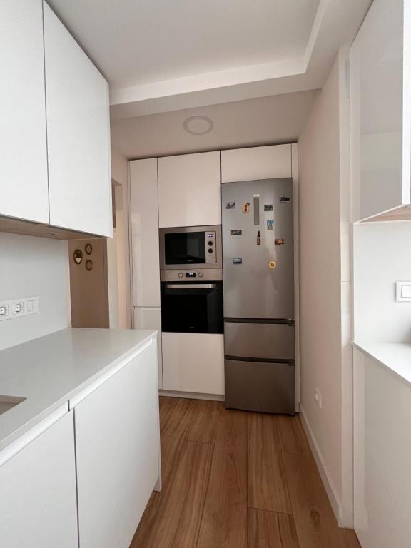 Kuchyňa alebo kuchynka v ubytovaní Apartamento Orilla de Triana