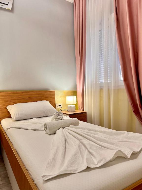 Postel nebo postele na pokoji v ubytování Hotel Nur