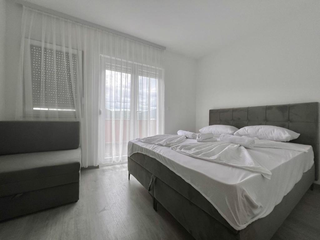 Postel nebo postele na pokoji v ubytování Hotel Nur