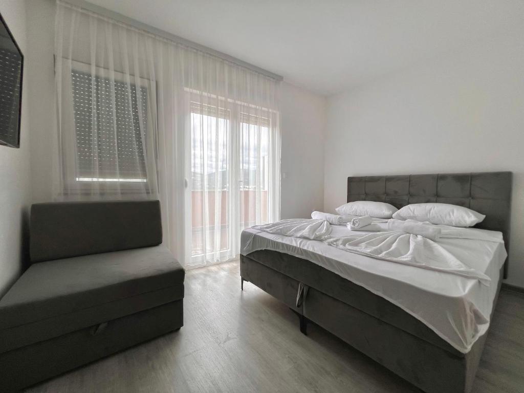 Postel nebo postele na pokoji v ubytování Hotel Nur