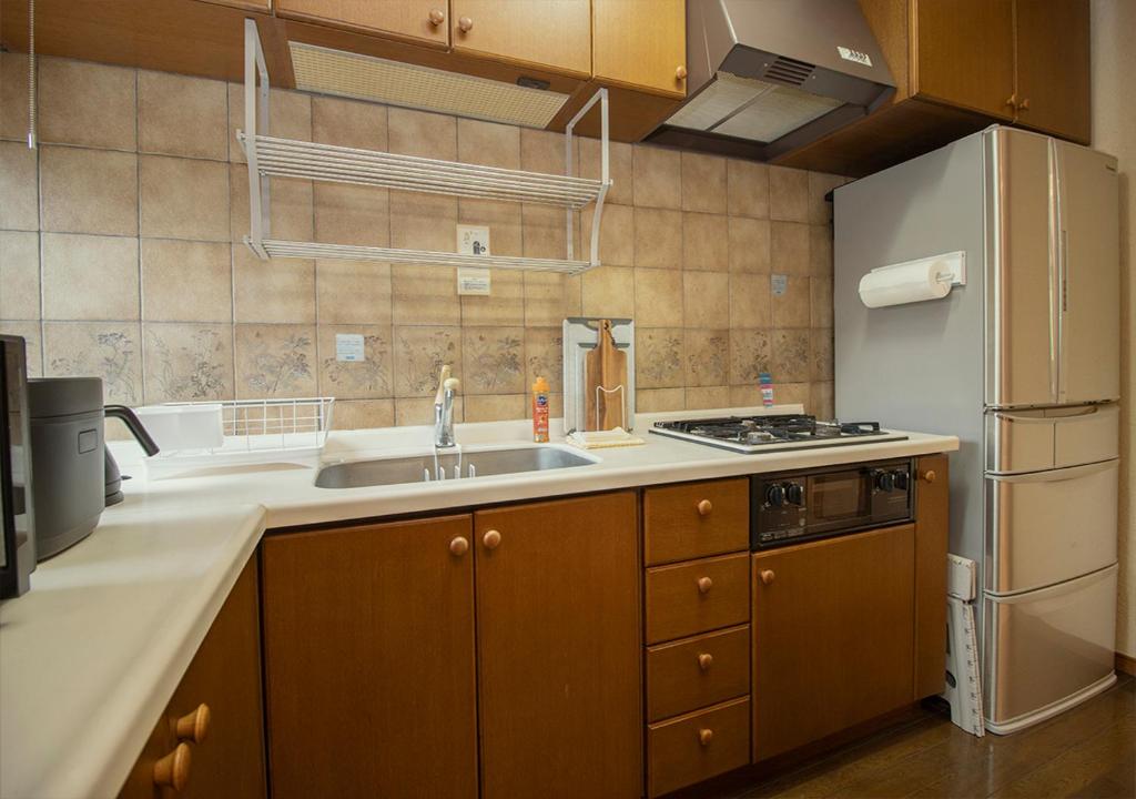 Kuchyň nebo kuchyňský kout v ubytování Villa ISE shima