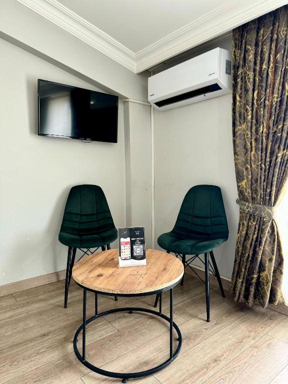 TV a/nebo společenská místnost v ubytování The Pashaam Suit Bakırköy