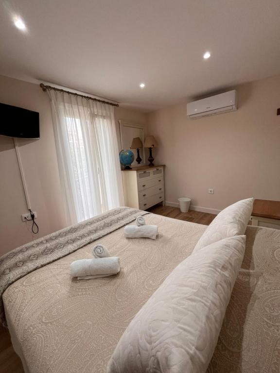 Posteľ alebo postele v izbe v ubytovaní Apartamento Orilla de Triana