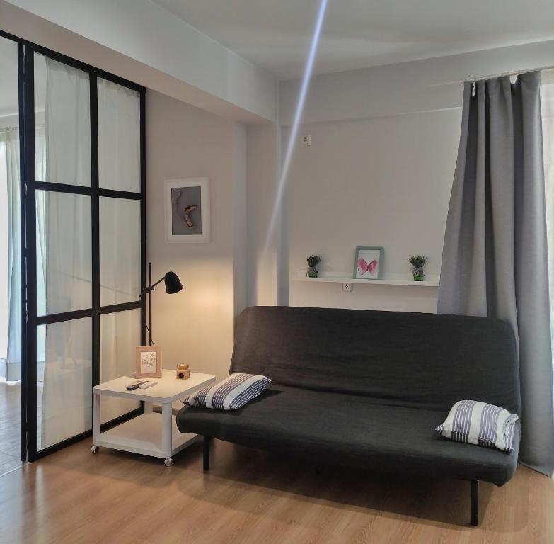 Ein Sitzbereich in der Unterkunft Apartment A1