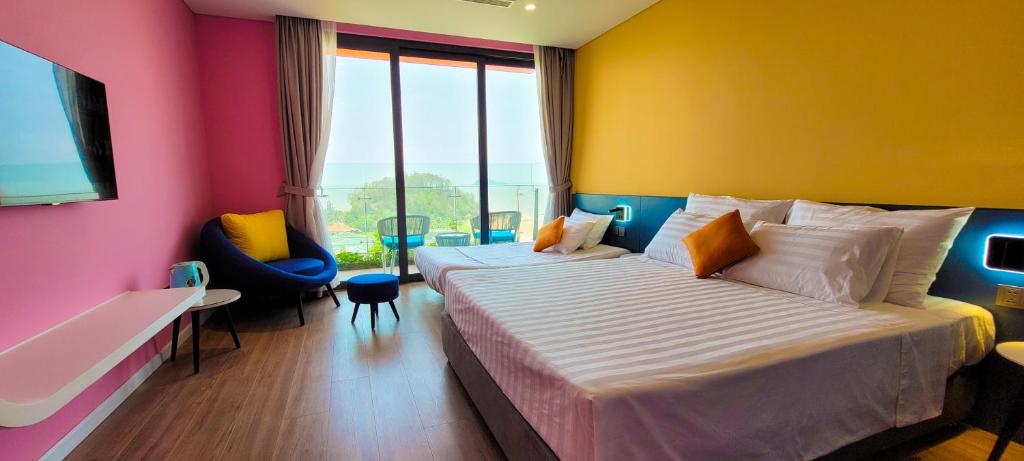 En eller flere senge i et værelse på FLAMING0 RESORT IB708 Hai tien