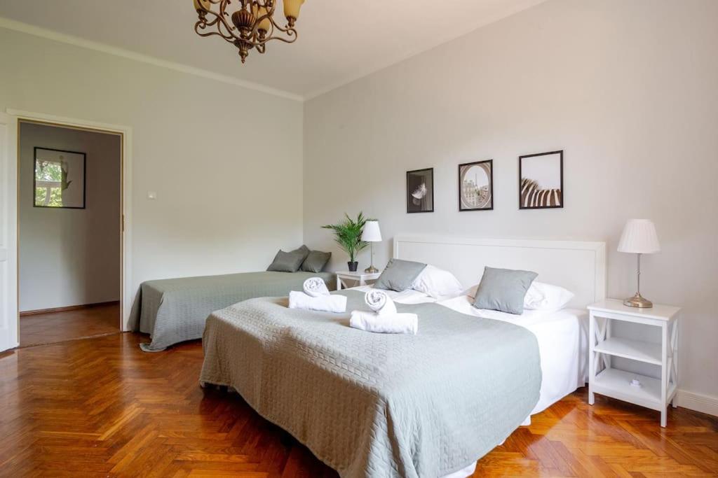 Posteľ alebo postele v izbe v ubytovaní Florianska Gate Luxury Apartments
