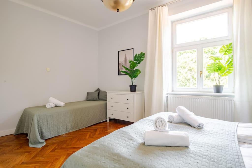 Posteľ alebo postele v izbe v ubytovaní Florianska Gate Luxury Apartments