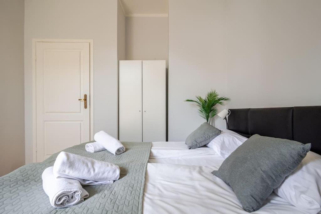 Posteľ alebo postele v izbe v ubytovaní Florianska Gate Luxury Apartments