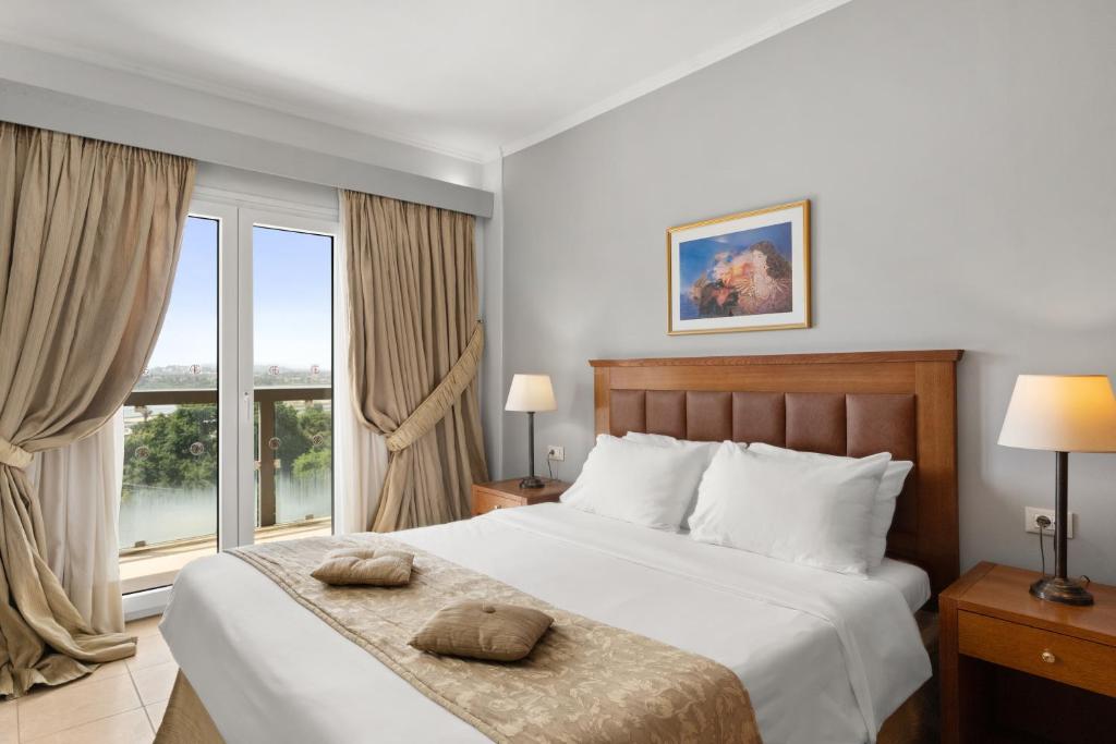 Letto o letti in una camera di Ariti Grand Hotel