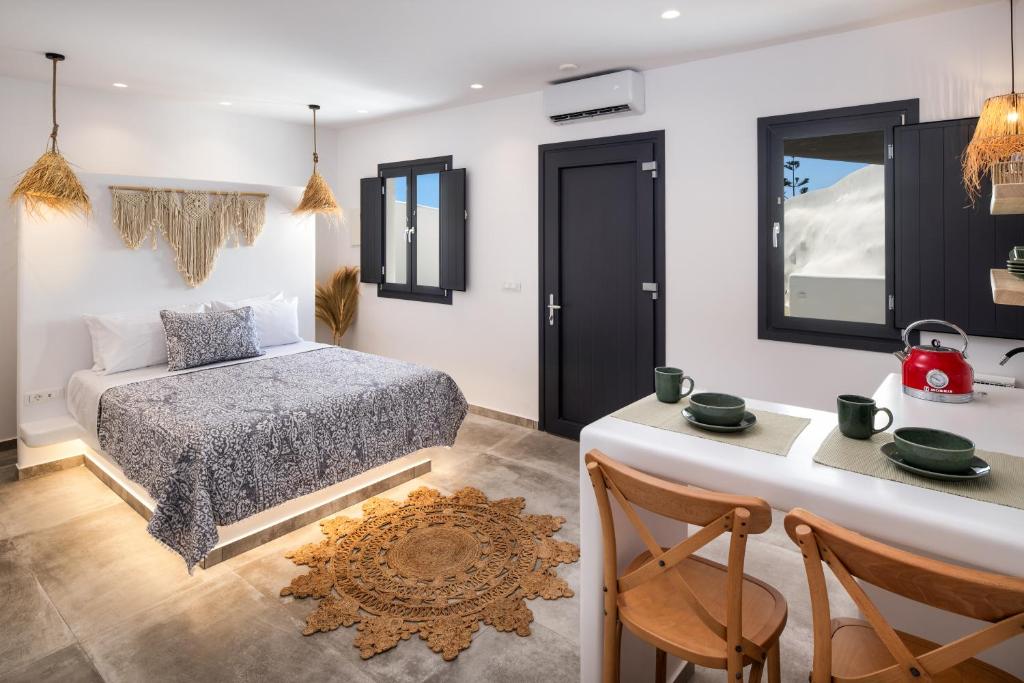 Postel nebo postele na pokoji v ubytování Terra Vecchia Suites