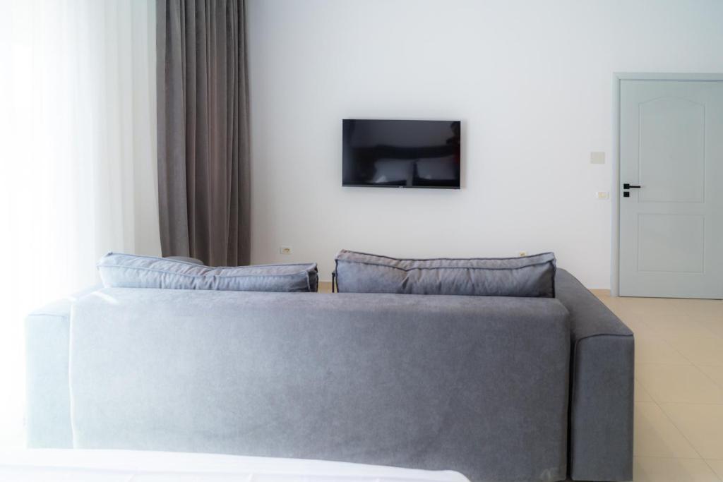 TV a/nebo společenská místnost v ubytování Enea Room in Center