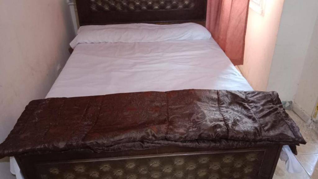 Postel nebo postele na pokoji v ubytování فندق التمساح