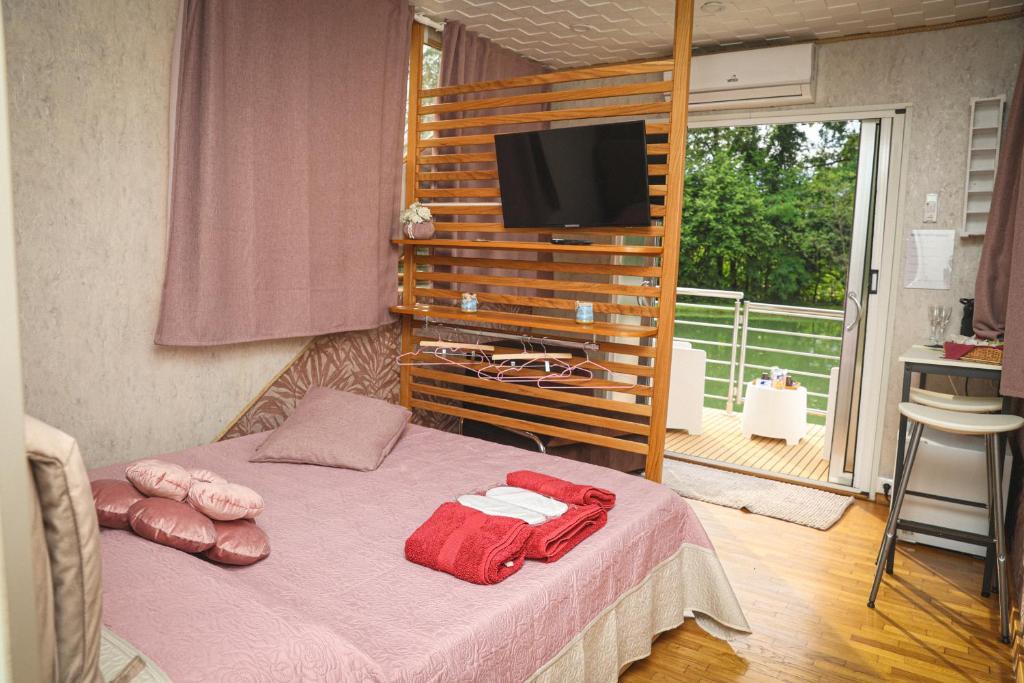 Postel nebo postele na pokoji v ubytování Floating Dream