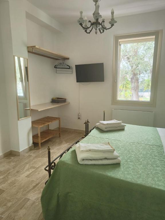 Postel nebo postele na pokoji v ubytování Villa Marianna