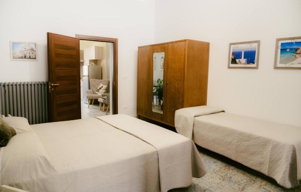 Postel nebo postele na pokoji v ubytování S Antonio House