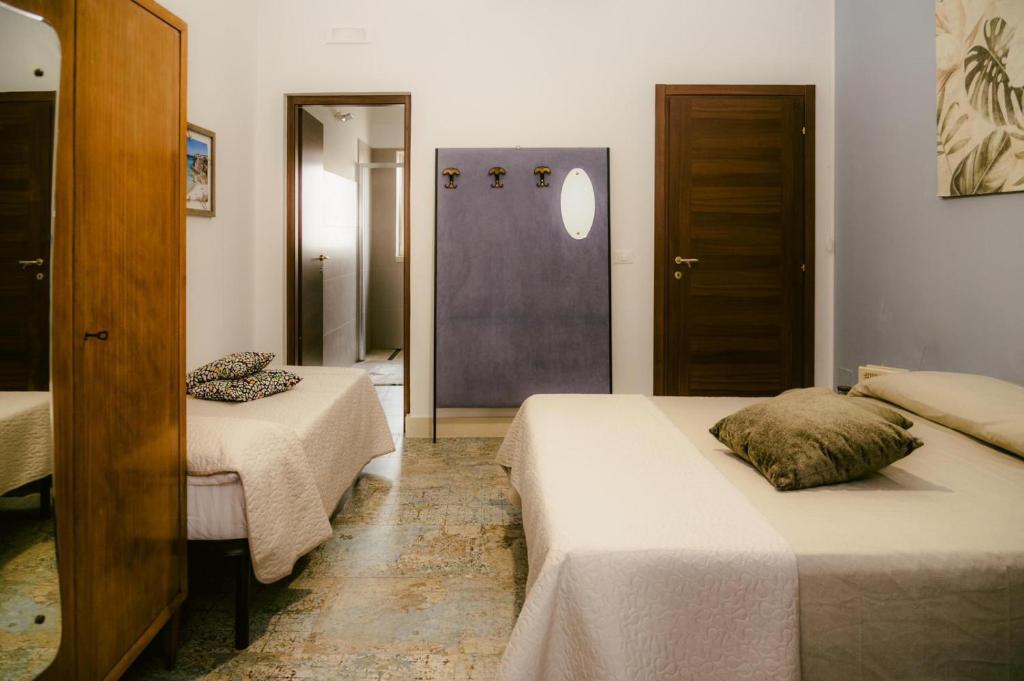 Postel nebo postele na pokoji v ubytování S Antonio House