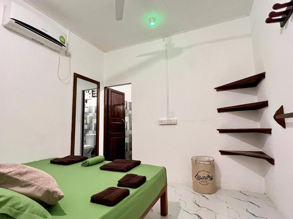 Postel nebo postele na pokoji v ubytování Arcadia villas Arugambay
