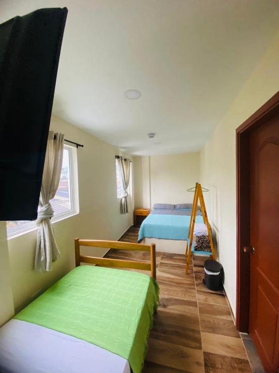 Postel nebo postele na pokoji v ubytování Hostal Don Jose
