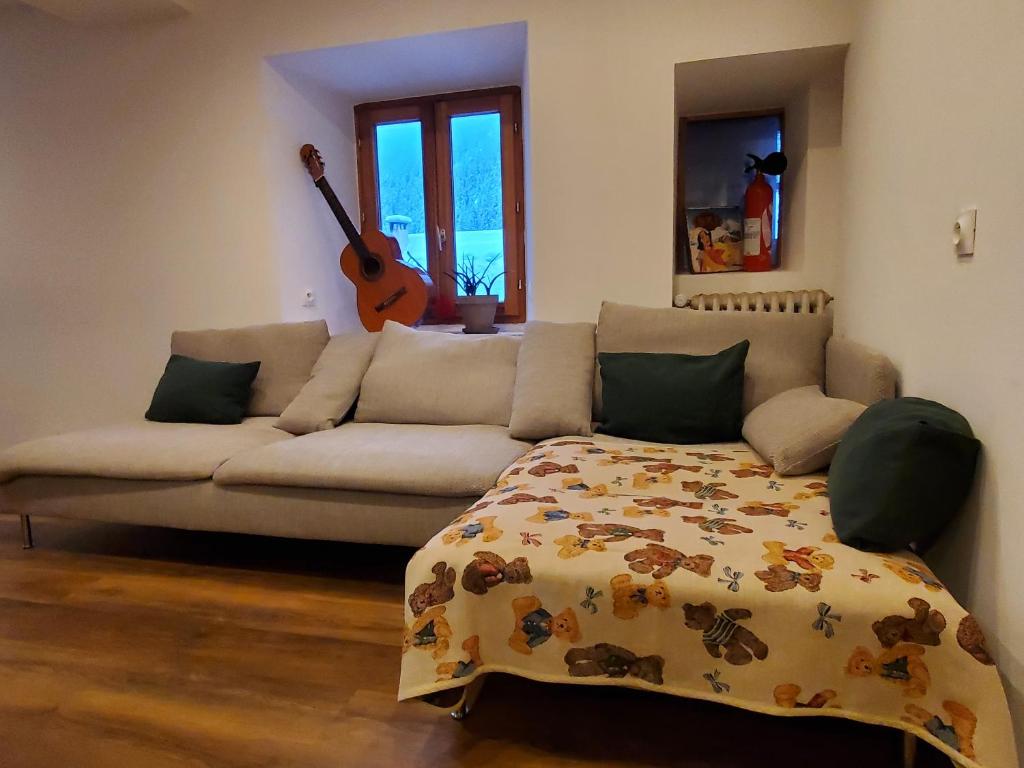 Posezení v ubytování Chambres au CampdeBase
