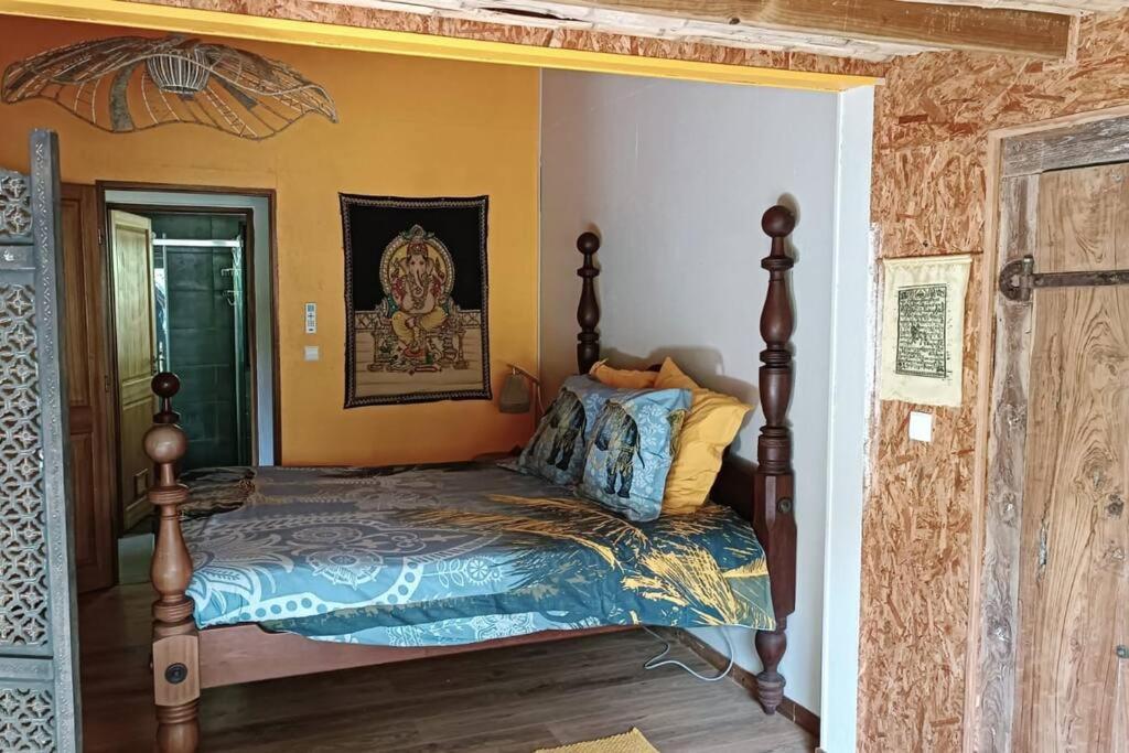 Postel nebo postele na pokoji v ubytování Terres D'Éden, Le Gîte de Charme