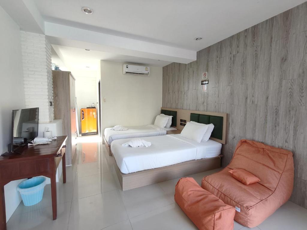 Postel nebo postele na pokoji v ubytování Baankasemsuk Resort 般咔 深宿