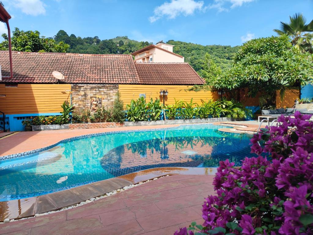 Bazén v ubytování Baankasemsuk Resort 般咔 深宿 nebo v jeho okolí