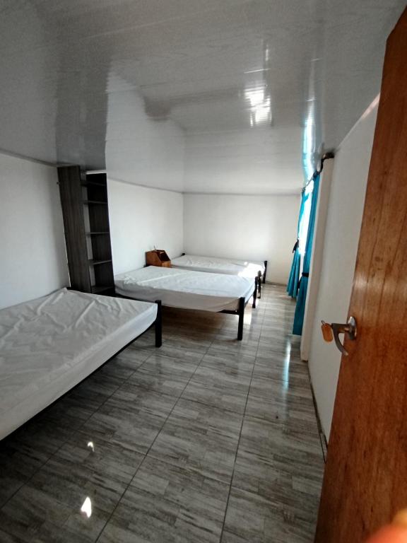 Postel nebo postele na pokoji v ubytování Mountain View Hostel