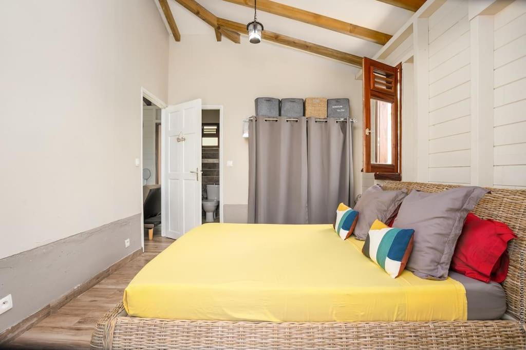 Postel nebo postele na pokoji v ubytování Bungalow Cactus