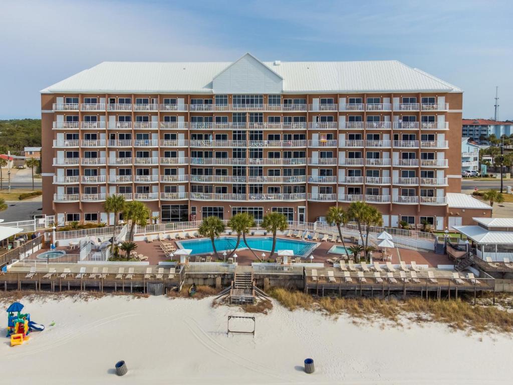 an aerial view of a resort with a pool at Palmetto Beachfront Hotel, a By The Sea Resort in Panama City Beach