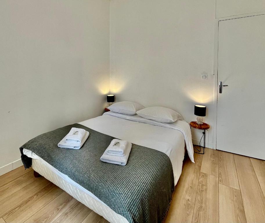 Posteľ alebo postele v izbe v ubytovaní Appartement T2 Place Carnot -DABNB
