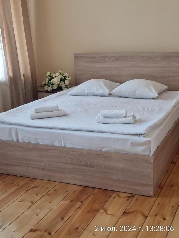 Postel nebo postele na pokoji v ubytování Guest House David's B&B