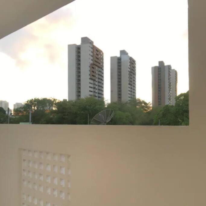 a city skyline with tall buildings in the background at Apartamento Confortável in Natal