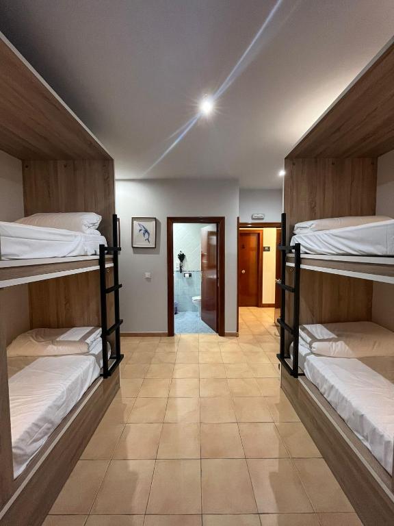 Postel nebo postele na pokoji v ubytování Hotel Branka