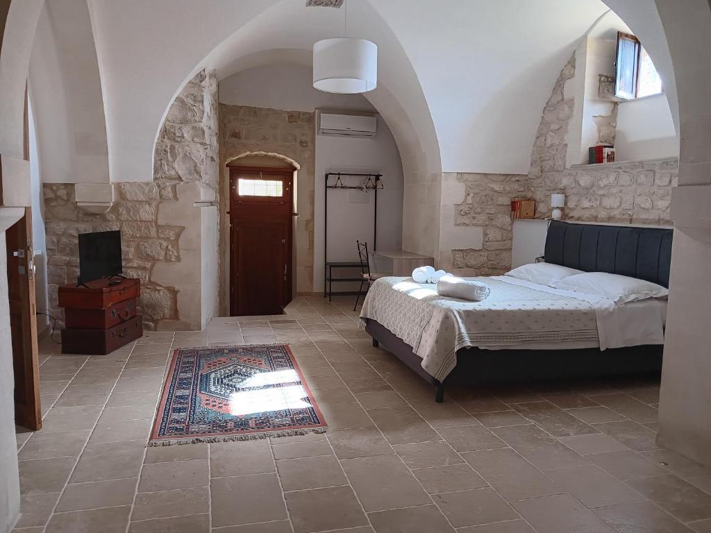Postel nebo postele na pokoji v ubytování Casa Sipione Papa