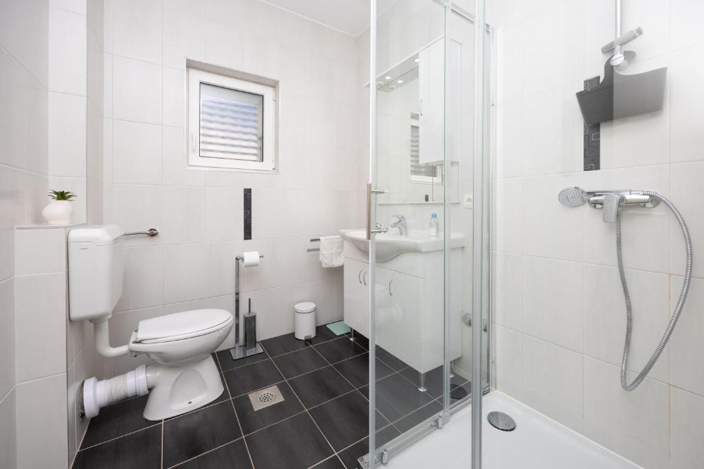 Kúpeľňa v ubytovaní Apartman Markulin