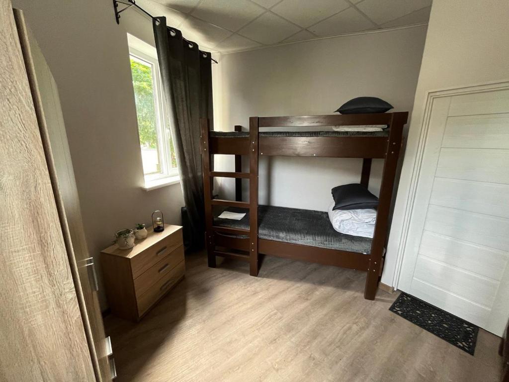 Voodi või voodid majutusasutuse Santel Apart Hostel toas