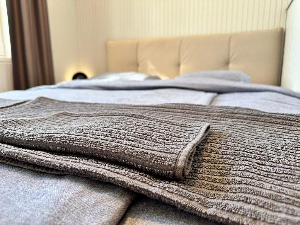 Posteľ alebo postele v izbe v ubytovaní Pálkövei 65. Apartman