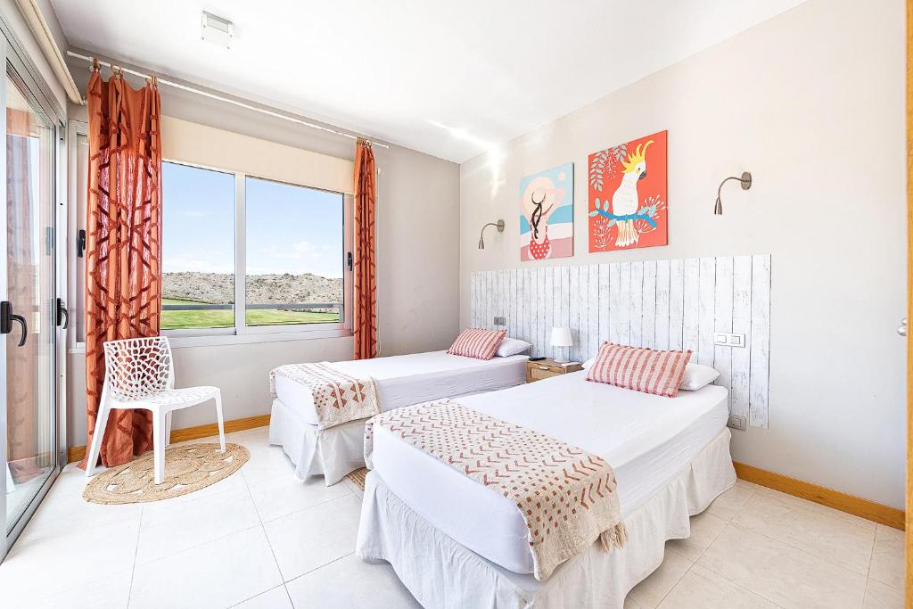 Łóżko lub łóżka w pokoju w obiekcie Vista Golf 12 by CanariasGetaway