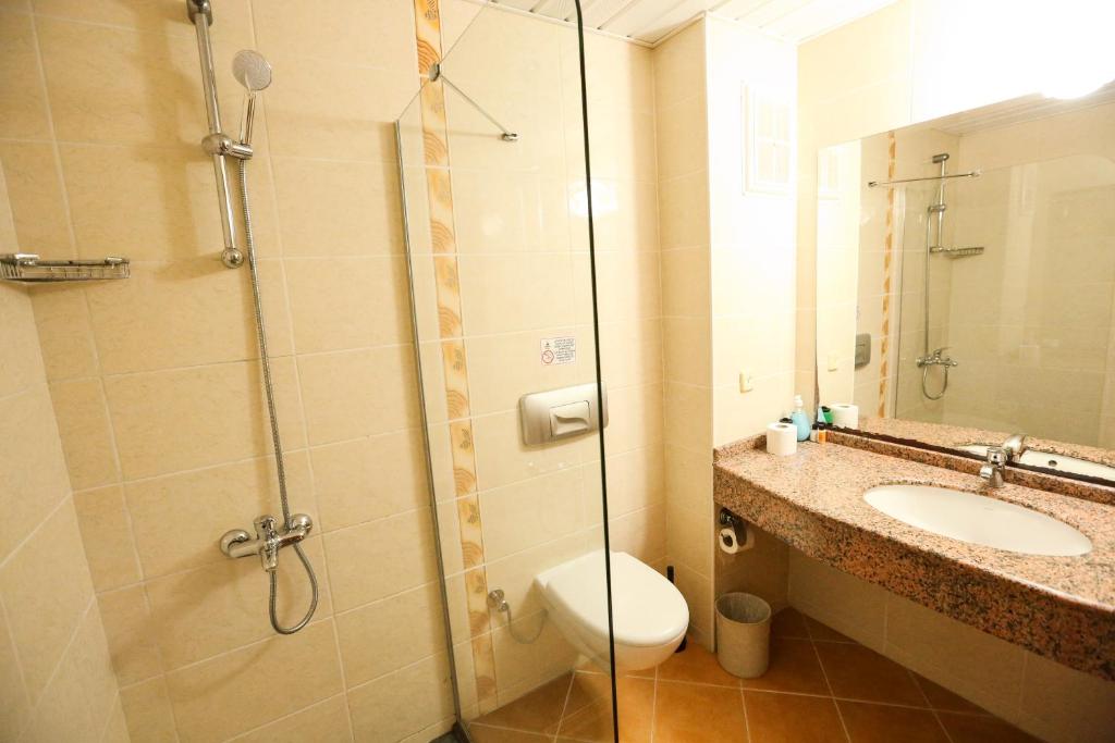 Koupelna v ubytování Mavruka Hotel