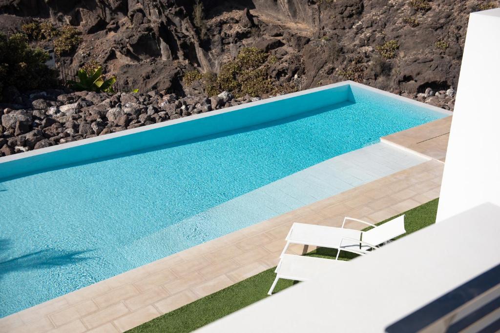 Bazén v ubytovaní KARAT Villa Playa Paraiso alebo v jeho blízkosti