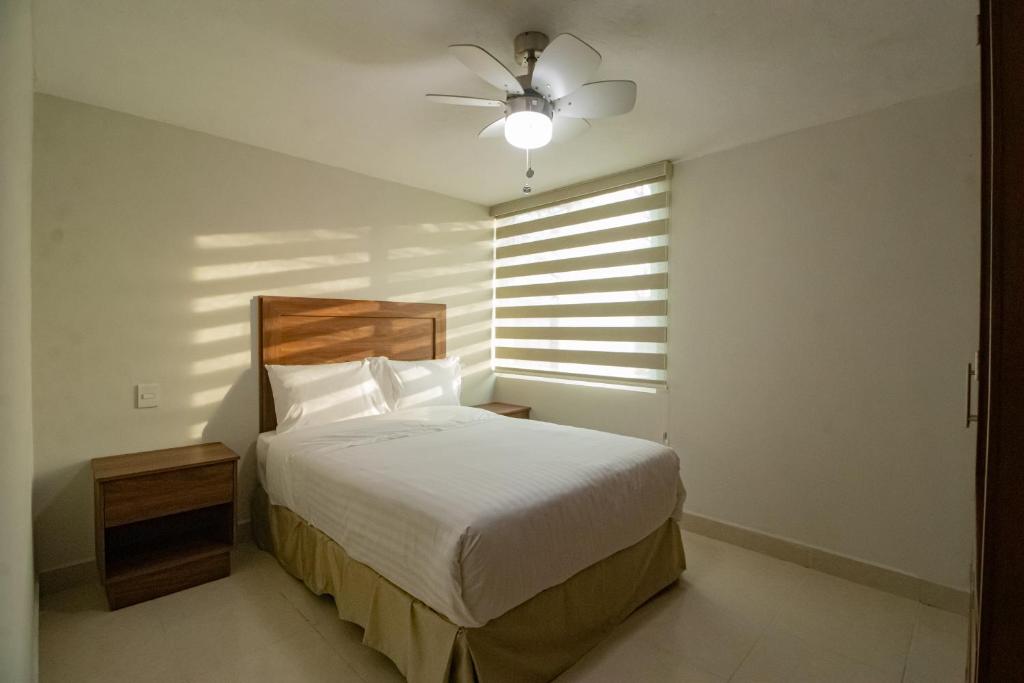 Postel nebo postele na pokoji v ubytování Memora Hotel & Villas Chapala