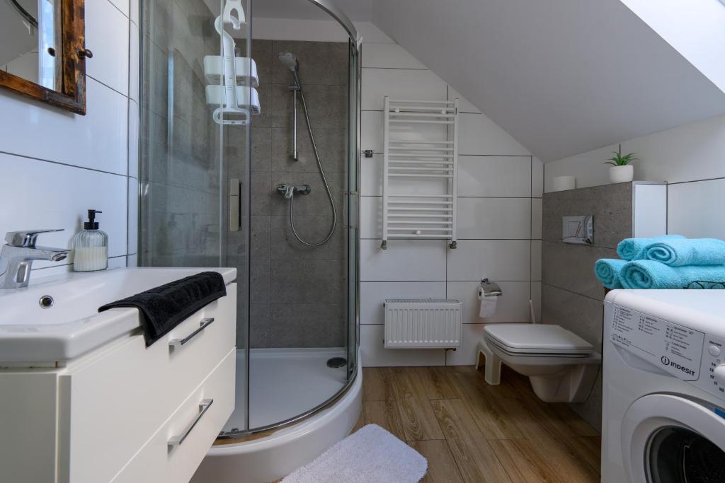 Koupelna v ubytování Apartamenty na Piątkę