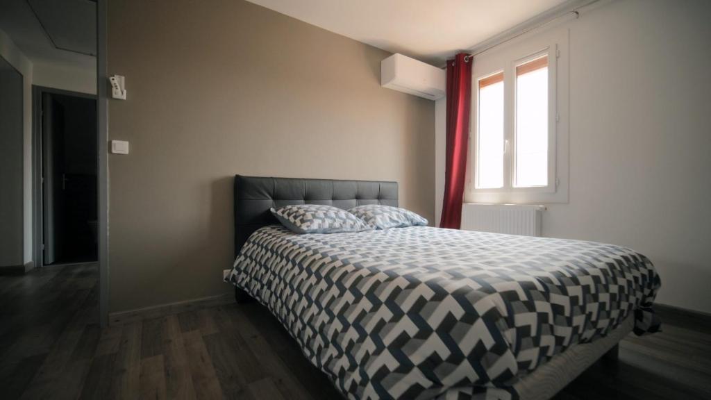 Posteľ alebo postele v izbe v ubytovaní Agréable Villa pour 8 personnes