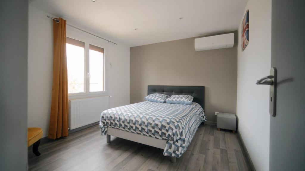 Posteľ alebo postele v izbe v ubytovaní Agréable Villa pour 8 personnes