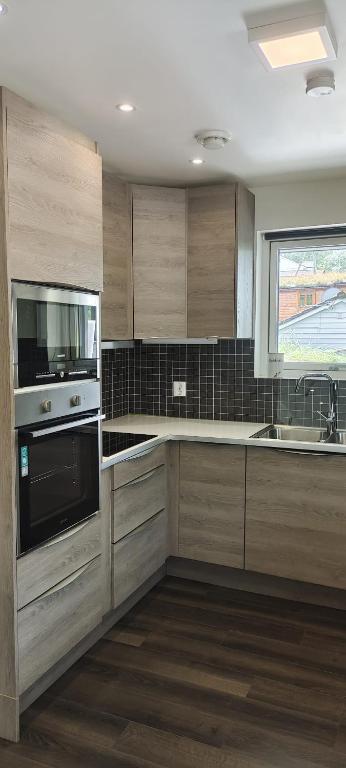 Kuchyň nebo kuchyňský kout v ubytování Lagunen Apartments